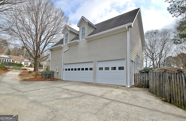 view of home's exterior with a garage