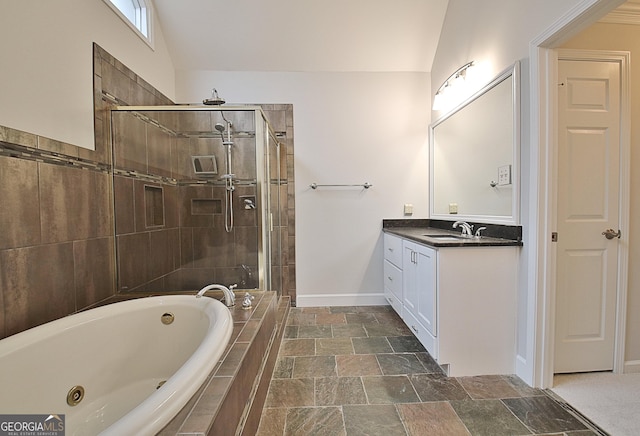 bathroom featuring vanity, lofted ceiling, and plus walk in shower