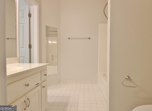 bathroom with vanity and tile patterned floors