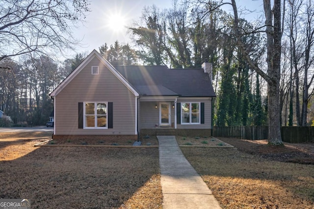 view of front of property with a front lawn