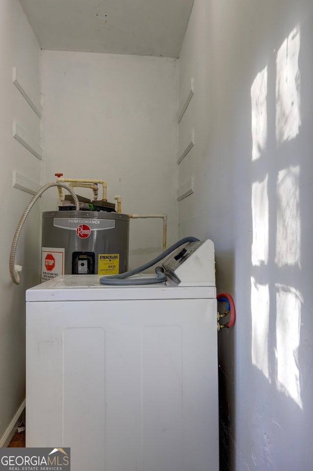 washroom with washer / dryer and electric water heater