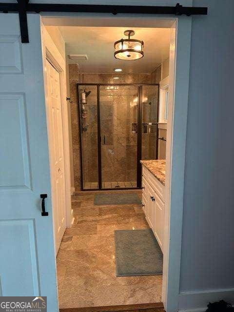 bathroom with vanity and walk in shower