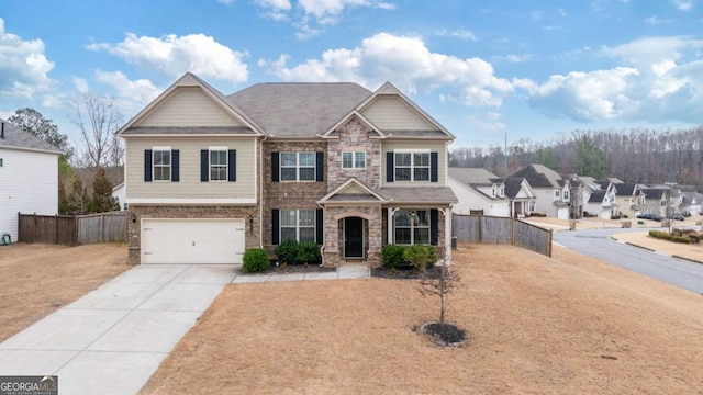 view of front of home with a garage