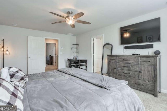 bedroom featuring light colored carpet and ceiling fan