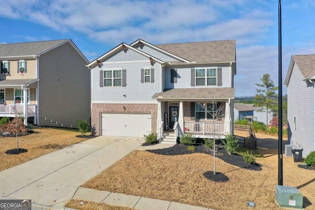 view of front of house featuring a garage and a porch