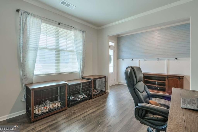 home office featuring hardwood / wood-style floors and crown molding