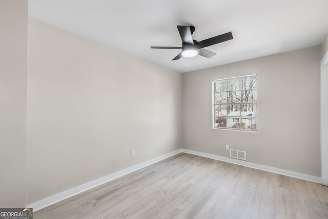 unfurnished room with ceiling fan and light hardwood / wood-style floors