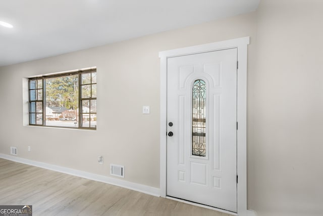 entrance foyer featuring light wood-type flooring