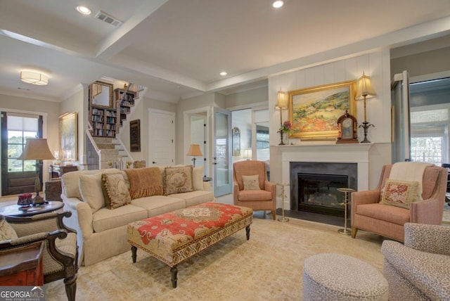 living room with crown molding