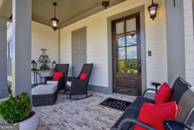 doorway to property with a porch
