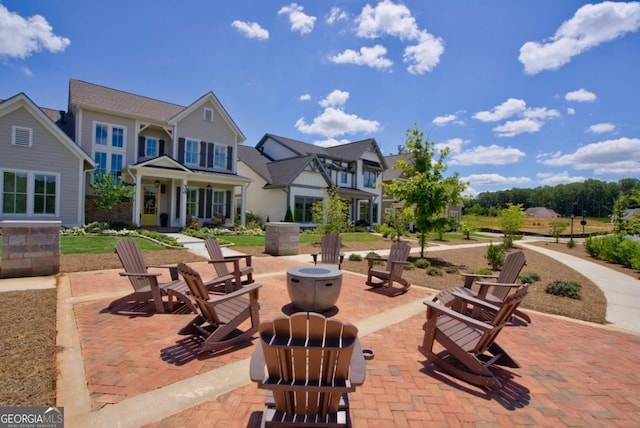 view of patio / terrace featuring a fire pit