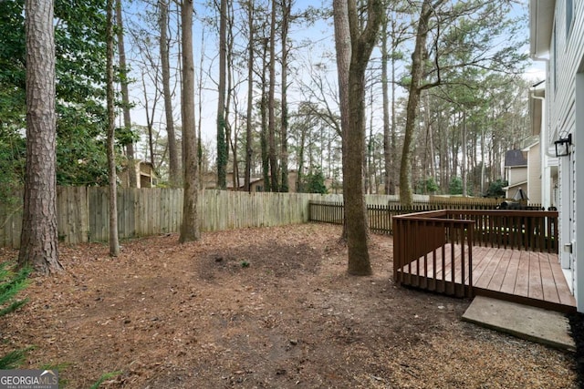 view of yard featuring a deck