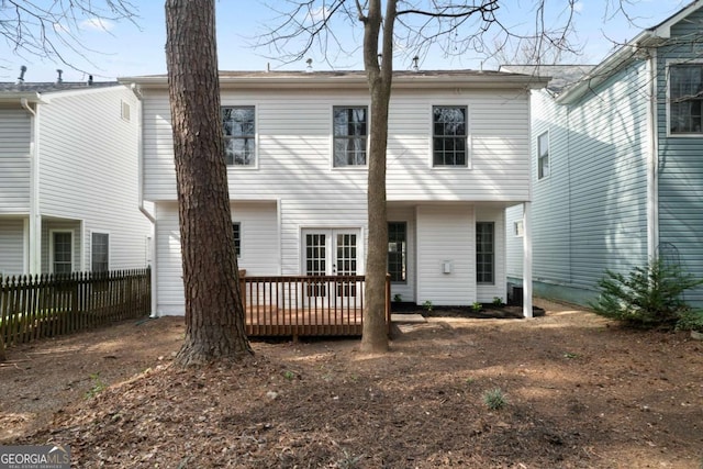 rear view of house with a deck