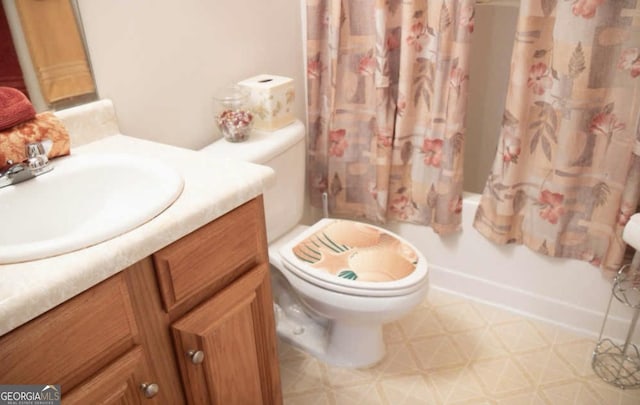 full bathroom with vanity, shower / bath combination with curtain, and toilet