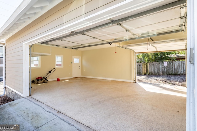 garage with fence