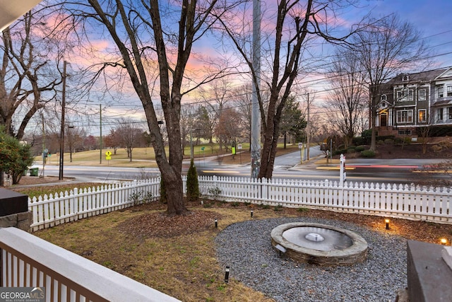 yard at dusk with fence