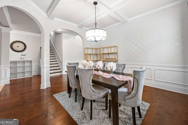 dining area with beamed ceiling, ornamental molding, coffered ceiling, and dark wood-type flooring