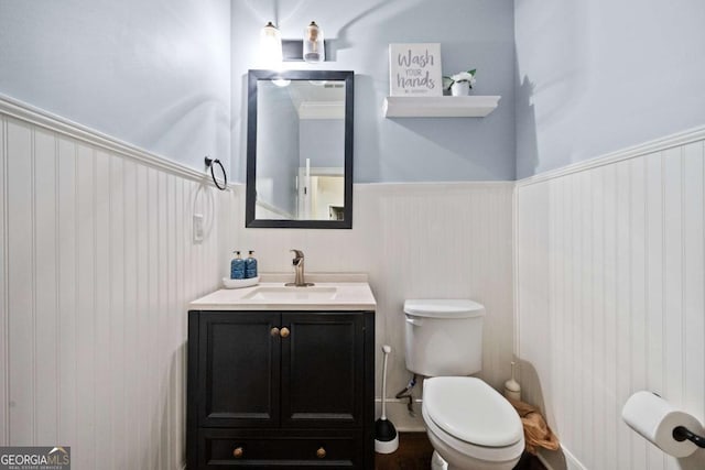 bathroom with vanity and toilet