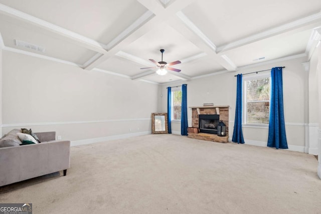 living room with coffered ceiling, ceiling fan, light carpet, and beamed ceiling