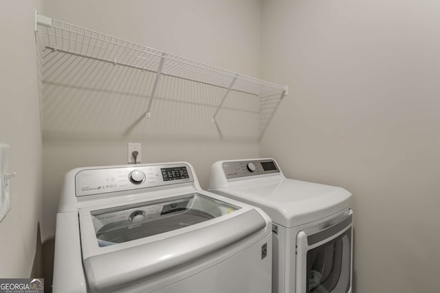 laundry room featuring independent washer and dryer