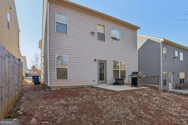 rear view of property with a patio area