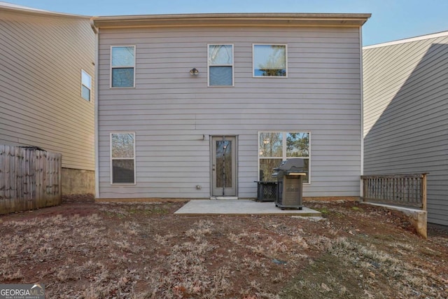 rear view of house with a patio area