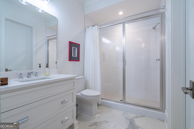 bathroom with vanity, curtained shower, and toilet