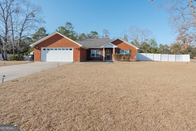 ranch-style house with a garage and a front yard