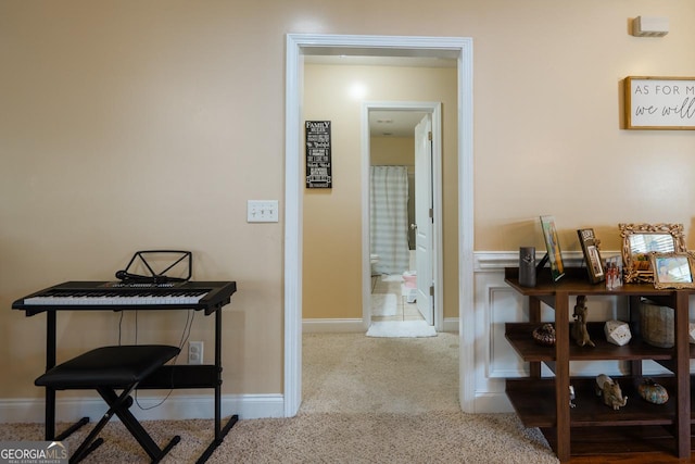 hall featuring carpet