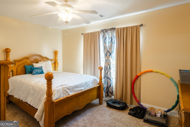 bedroom featuring ceiling fan and carpet floors