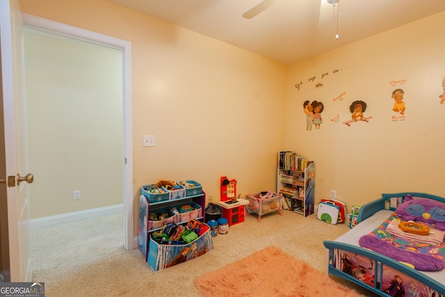 bedroom featuring ceiling fan and carpet flooring