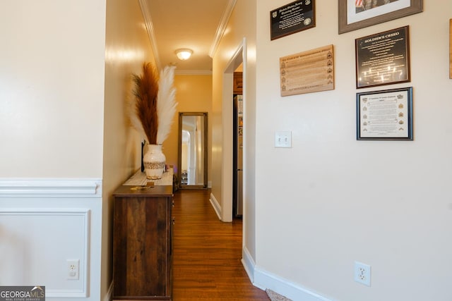 hall featuring crown molding and dark wood-type flooring