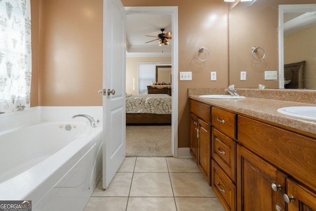 bathroom with vanity, plenty of natural light, tile patterned floors, and ceiling fan