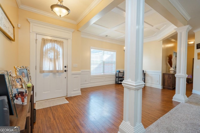 foyer featuring coffered ceiling, ornate columns, crown molding, dark hardwood / wood-style flooring, and beamed ceiling