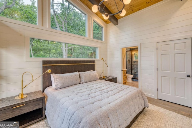 bedroom with wooden walls, wooden ceiling, beam ceiling, and light hardwood / wood-style flooring