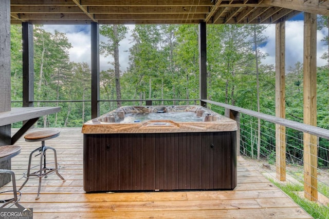 unfurnished sunroom with a jacuzzi