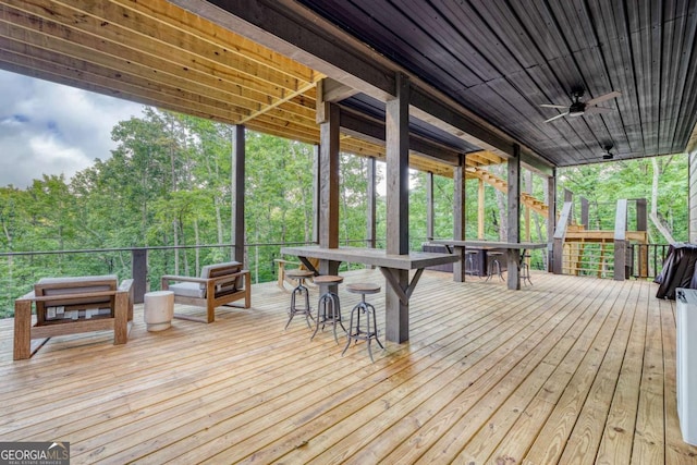 wooden terrace with ceiling fan