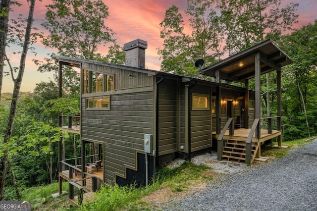 view of property exterior at dusk