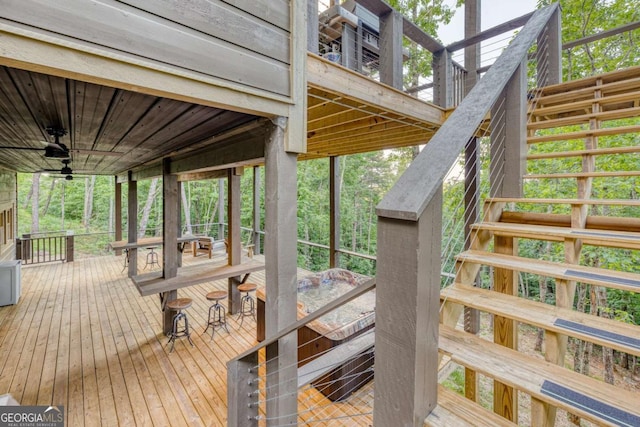 wooden deck with ceiling fan