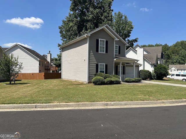 view of front property with a porch and a front yard