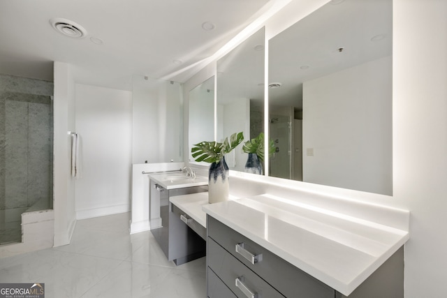 bathroom featuring a shower stall, visible vents, and vanity