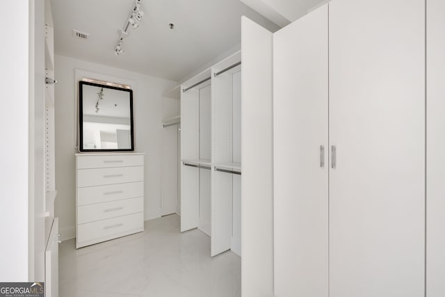 spacious closet with visible vents