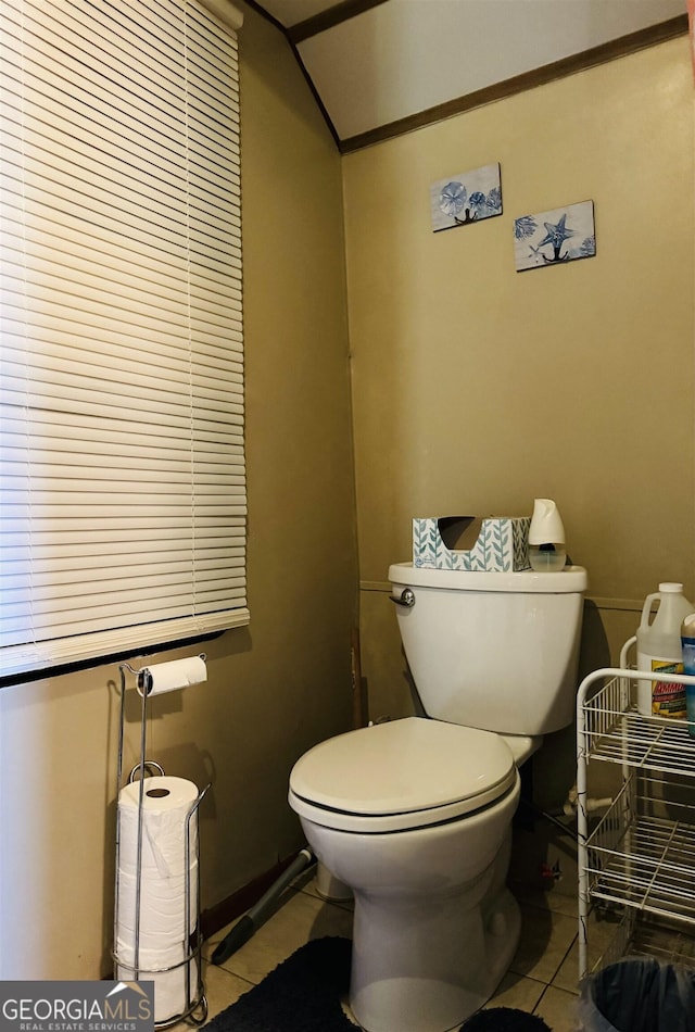 bathroom featuring tile patterned floors and toilet