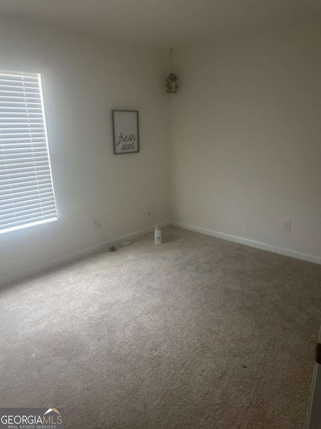 view of carpeted spare room