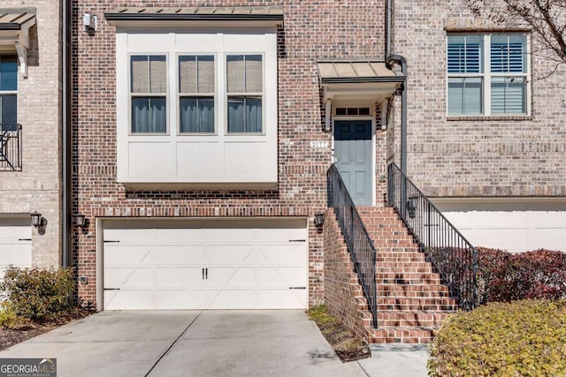 view of exterior entry featuring a garage