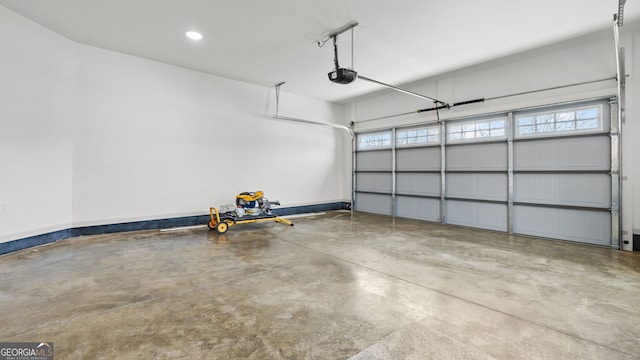 garage featuring a garage door opener