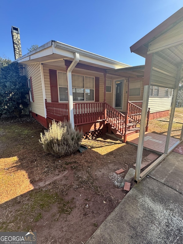 view of front of home featuring covered porch