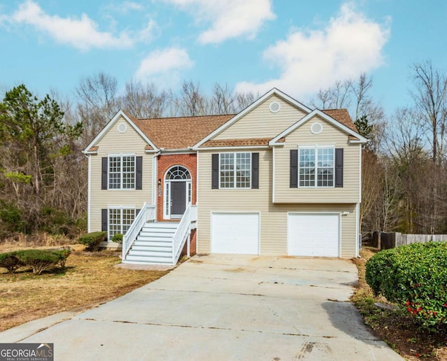 bi-level home featuring a garage