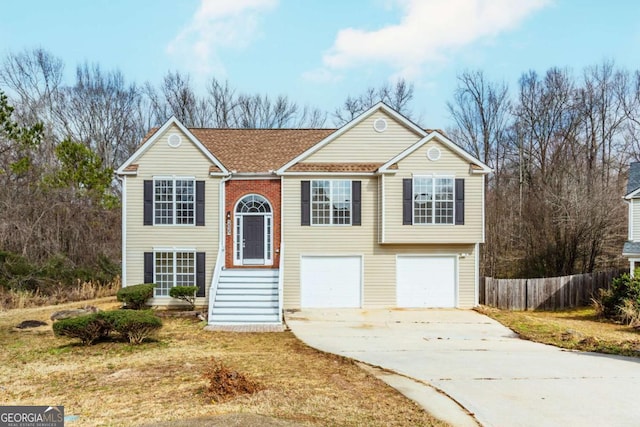 bi-level home featuring a garage