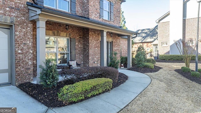 entrance to property with a porch